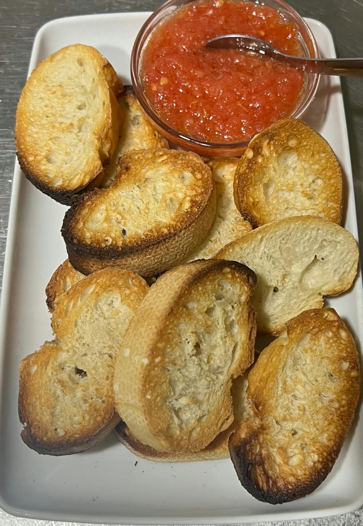 Ración de pan con tomate